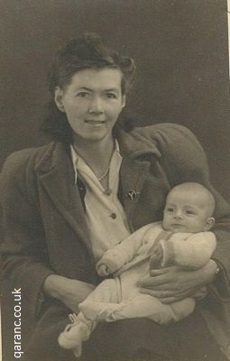 Baby photo with mother black white 1947